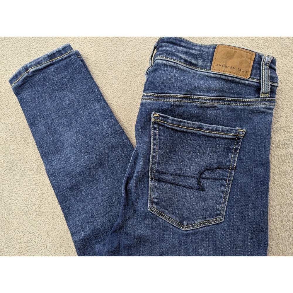 American Eagle Super Hi-Rise Jeggings Size 4 Blue Distressed Ripped Jeans